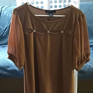 An Adele & May blouse brown with gems on front.